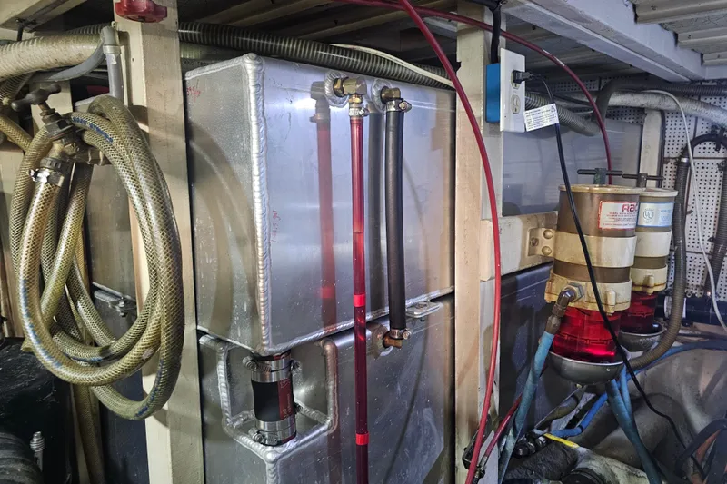 Marytime Yacht Photos Pics Engine room of 1987 Grand Banks 42 Europa with fuel filters and hoses.