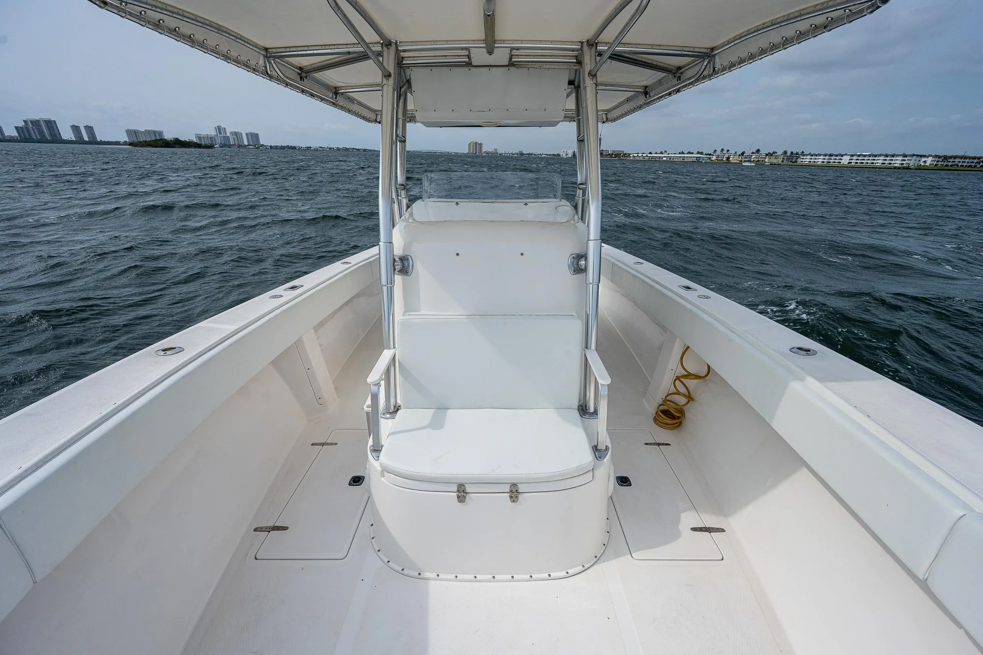 1999 Venture 34 Open CC boat on open water, deck view.