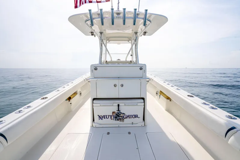  Yacht Photos Pics 2014 SeaVee 34 boat with center console on calm ocean waters.