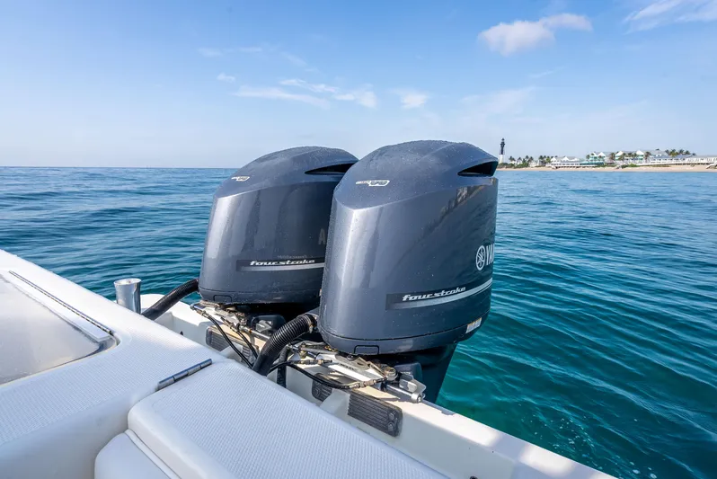  Yacht Photos Pics 2014 SeaVee 34 boat with twin outboard engines on open water.