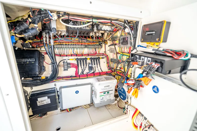  Yacht Photos Pics Electrical system of a 2014 SeaVee 34 boat, showcasing wiring and components.