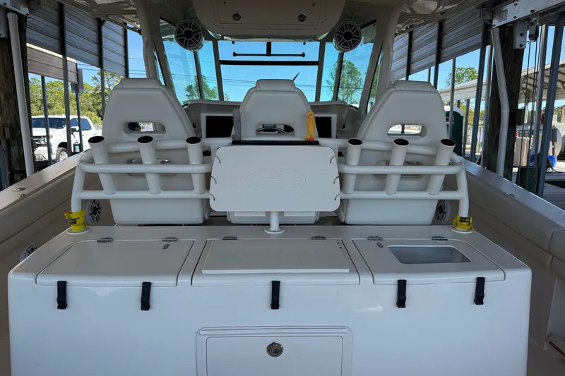  Yacht Photos Pics 2015 Grady-White Canyon 376 boat interior with seating and storage compartments.
