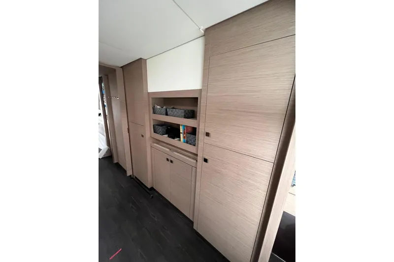 Portlish Yacht Photos Pics Interior of 2022 Fountaine Pajot Tanna 47 yacht with sleek wooden cabinetry.