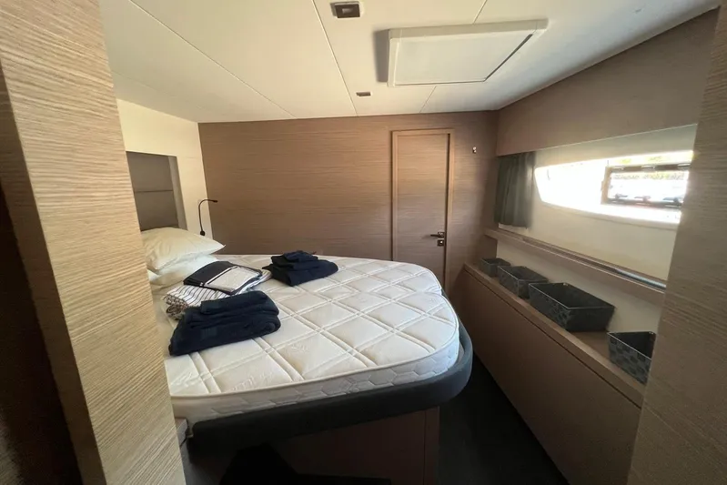 Portlish Yacht Photos Pics Luxurious cabin interior of 2022 Fountaine Pajot Tanna 47 yacht with cozy bed.