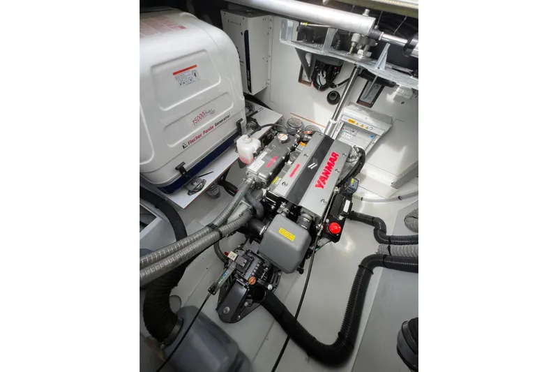 Portlish Yacht Photos Pics Engine room of 2022 Fountaine Pajot Tanna 47 with Yanmar engine and generator.