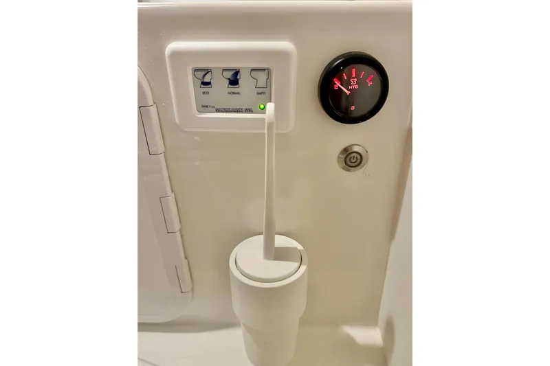 Delphin Yacht Photos Pics Control panel and gauge in 2023 Nimbus Weekender 9 boat bathroom.