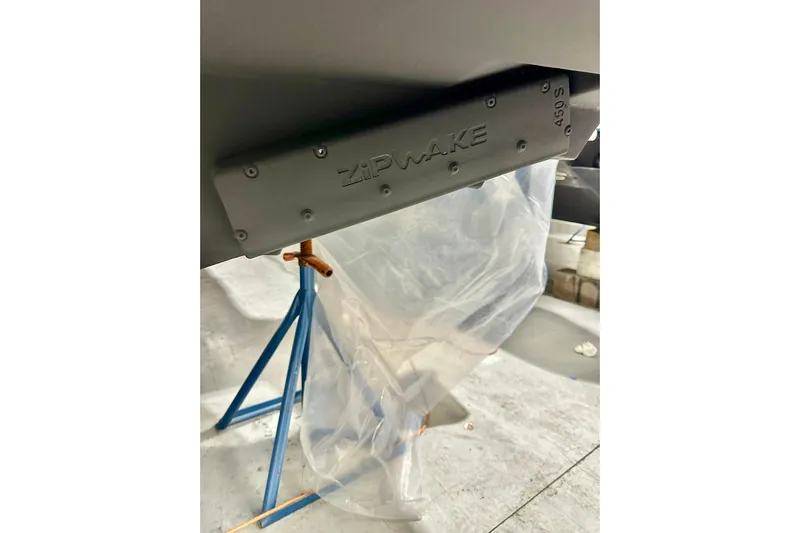 Delphin Yacht Photos Pics 2023 Nimbus Weekender 9 with Zipwake system on a boat stand.