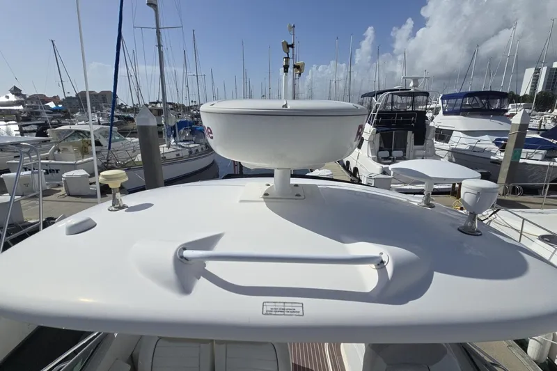  Yacht Photos Pics 2010 Sea Ray 350 Sundancer yacht docked at marina with radar equipment.