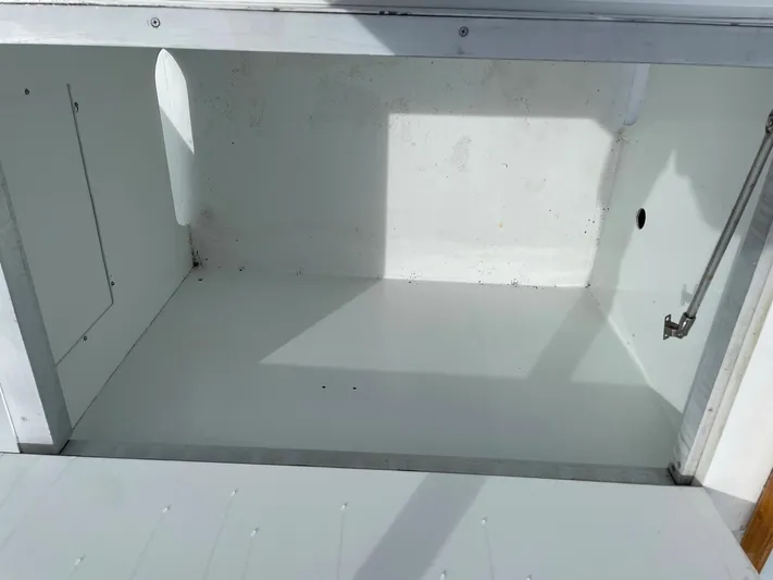  Yacht Photos Pics Empty storage compartment on a 1965 Burger 78' Cockpit Flybridge Motor Yacht.