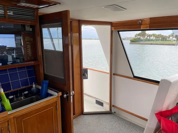  Yacht Photos Pics Interior of 1965 Burger 78' Cockpit Flybridge Motor Yacht with ocean view.