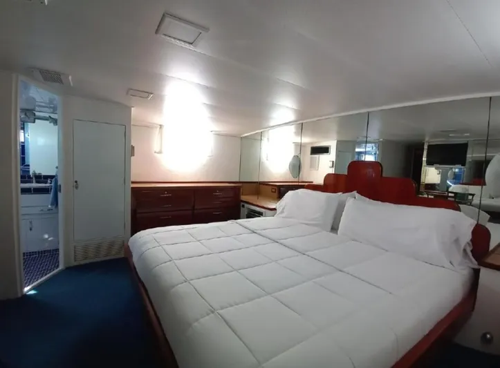  Yacht Photos Pics Luxurious bedroom interior of 1965 Burger 78' Cockpit Flybridge Motor Yacht.