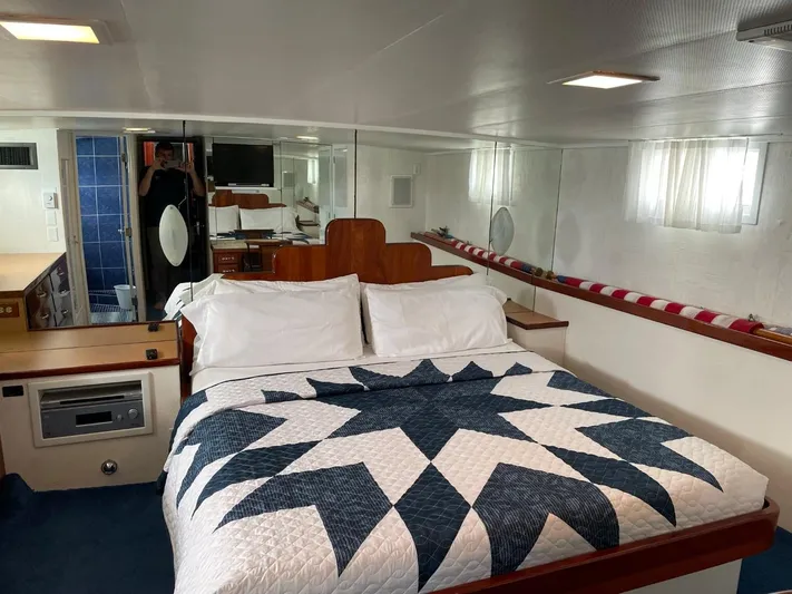  Yacht Photos Pics Luxurious bedroom in 1965 Burger 78' Cockpit Flybridge Motor Yacht with nautical decor.