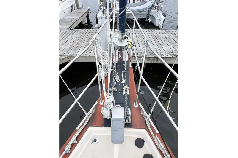 Delicia Yacht Photos Pics Bow view of 1995 Island Packet 40 sailboat docked at marina.