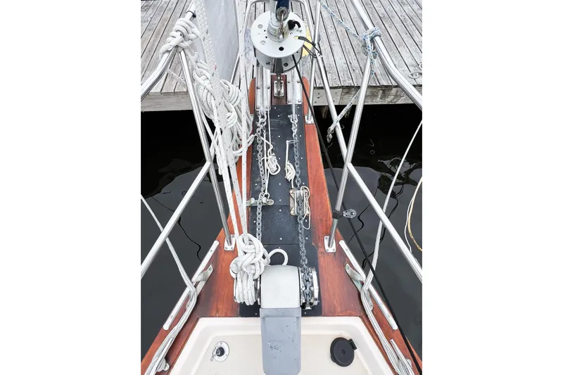 Delicia Yacht Photos Pics Bow view of 1995 Island Packet 40 sailboat with ropes and deck details.