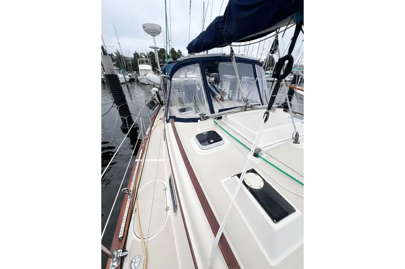 Delicia Yacht Photos Pics 1995 Island Packet 40 sailboat docked, showcasing deck and rigging details.