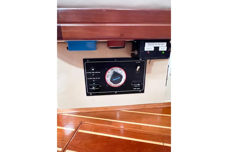 Delicia Yacht Photos Pics Control panel of a 1995 Island Packet 40 sailboat with bilge pump switches.