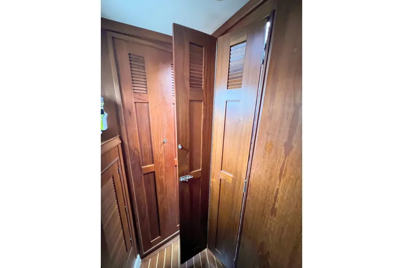 Delicia Yacht Photos Pics Wooden interior doors on a 1995 Island Packet 40 yacht.