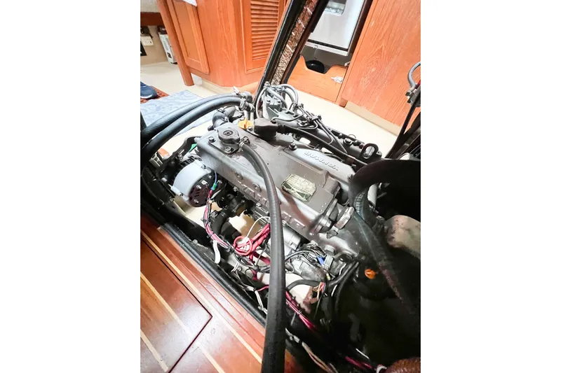 Delicia Yacht Photos Pics Engine compartment of a 1995 Island Packet 40 sailboat, showcasing mechanical components.