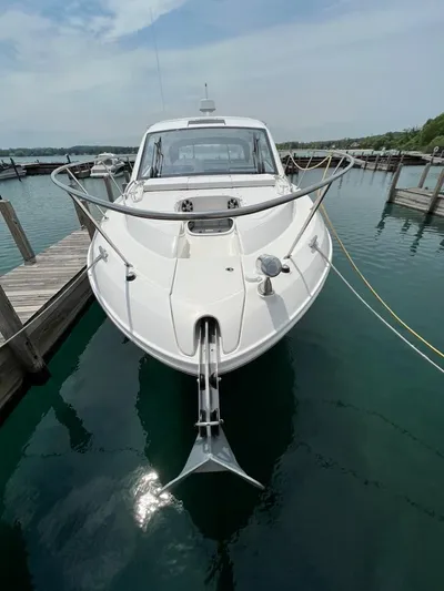  Yacht Photos Pics 2019 Sea Ray Sundancer 350 Coupe docked in a marina.
