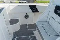 Reel Fed Up Yacht Photos Pics 2007 Fountain 38 Tournament Edition boat interior with seating and speaker.