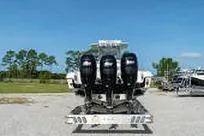 Reel Fed Up Yacht Photos Pics 2007 Fountain 38 Tournament Edition boat with triple outboard engines on a trailer.