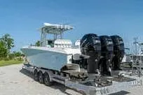 Reel Fed Up Yacht Photos Pics 2007 Fountain 38 Tournament Edition boat on trailer with triple outboard engines.