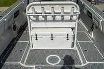 Reel Fed Up Yacht Photos Pics 2007 Fountain 38 Tournament Edition boat interior with rod holders and storage.