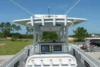 Reel Fed Up Yacht Photos Pics 2007 Fountain 38 Tournament Edition boat with center console and electronics, set against a clear sky.