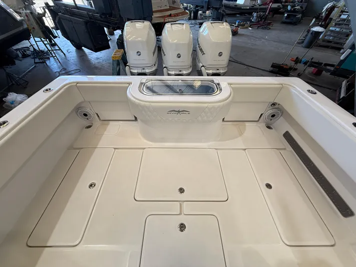  Yacht Photos Pics 2022 Invincible 39 Open Fisherman boat deck with triple outboard engines.