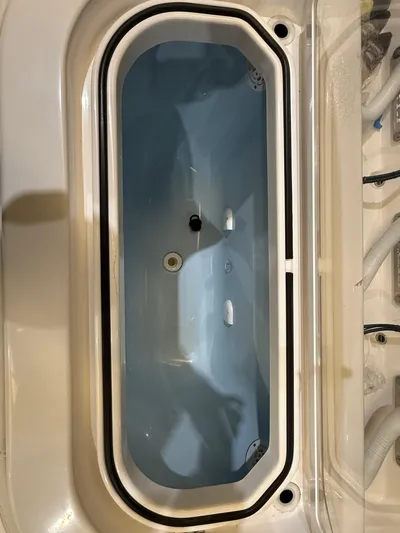  Yacht Photos Pics 2022 Invincible 39 Open Fisherman livewell interior, featuring a sleek, modern design.