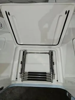  Yacht Photos Pics 2022 Invincible 39 Open Fisherman boat ladder compartment, open hatch view.
