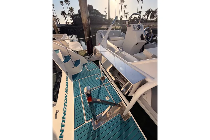 Island Time Yacht Photos Pics 1998 Sea Ray 420 Aft Cabin boat deck with blue flooring and steering wheel.