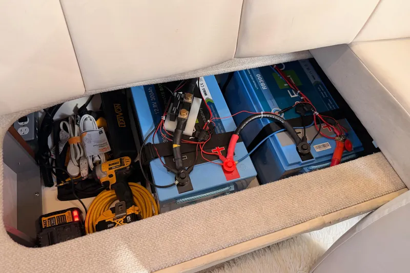 Island Time Yacht Photos Pics Battery compartment of a 1998 Sea Ray 420 Aft Cabin with tools and wiring.