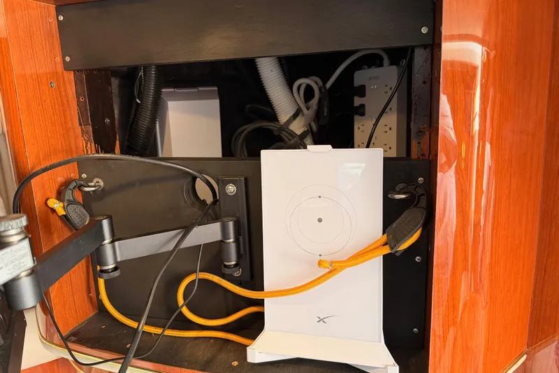 Island Time Yacht Photos Pics 1998 Sea Ray 420 Aft Cabin interior with electronic equipment and wiring setup.