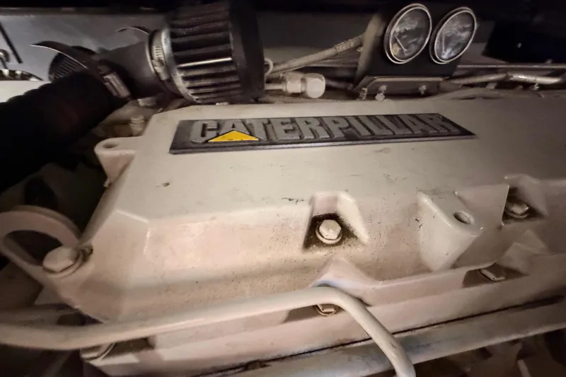 Island Time Yacht Photos Pics Caterpillar engine in a 1998 Sea Ray 420 Aft Cabin yacht, close-up view.