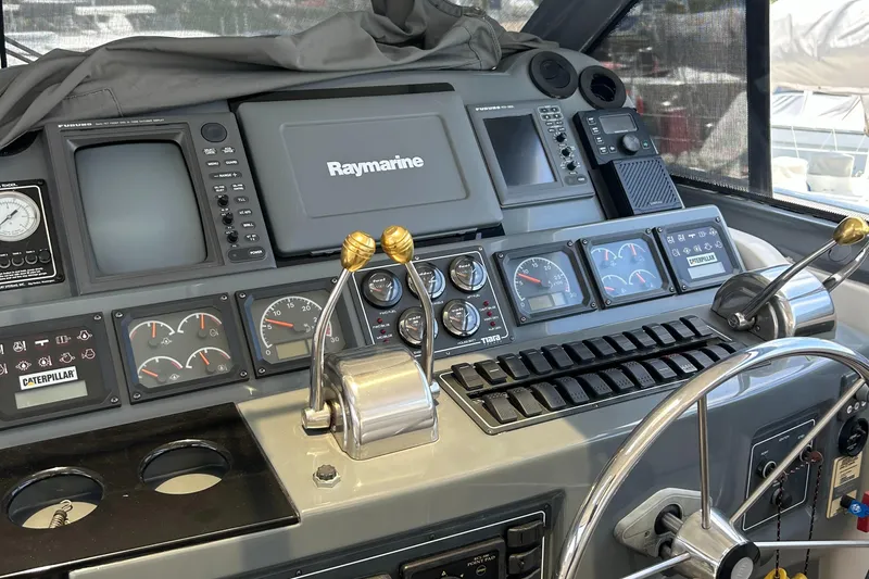 Dividend Yacht Photos Pics Control panel of 2000 Tiara Yachts 5000 Express with Raymarine navigation system.