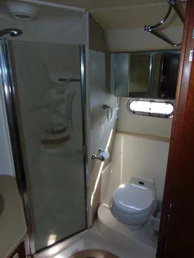 Dividend Yacht Photos Pics Bathroom interior of 2000 Tiara Yachts 5000 Express with shower and toilet.