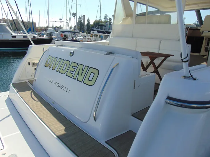 Dividend Yacht Photos Pics 2000 Tiara Yachts 5000 Express docked, featuring "DIVIDEND" nameplate, Las Vegas, NV.