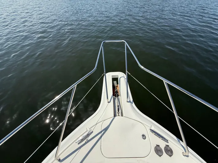 Stress Relief Yacht Photos Pics Bow view of 2007 Silverton 36 Convertible yacht on calm water.