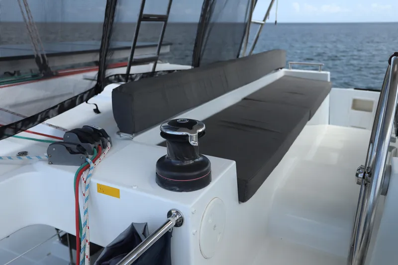 Momentum Yacht Photos Pics Luxurious Lagoon 450 F catamaran deck with seating, winch, and ocean view, 2012 model.