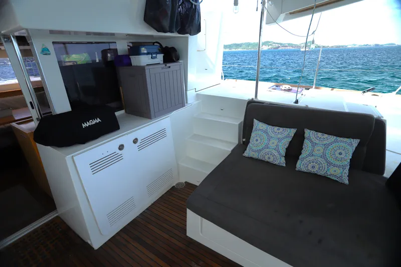 Momentum Yacht Photos Pics Interior of 2012 Lagoon 450 F catamaran with seating and ocean view.