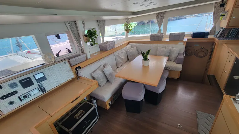 Momentum Yacht Photos Pics Interior of 2012 Lagoon 450 F catamaran with spacious seating and modern decor.