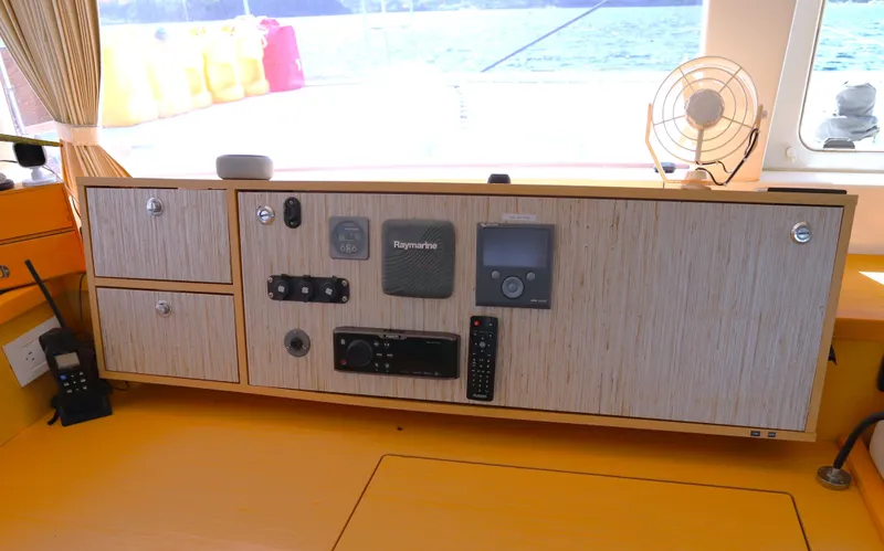 Momentum Yacht Photos Pics Control panel of a 2012 Lagoon 450 F catamaran with navigation equipment.