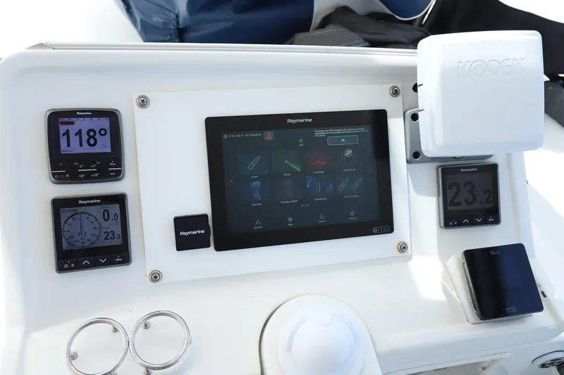 Momentum Yacht Photos Pics Control panel of a 2012 Lagoon 450 F catamaran with navigation instruments.