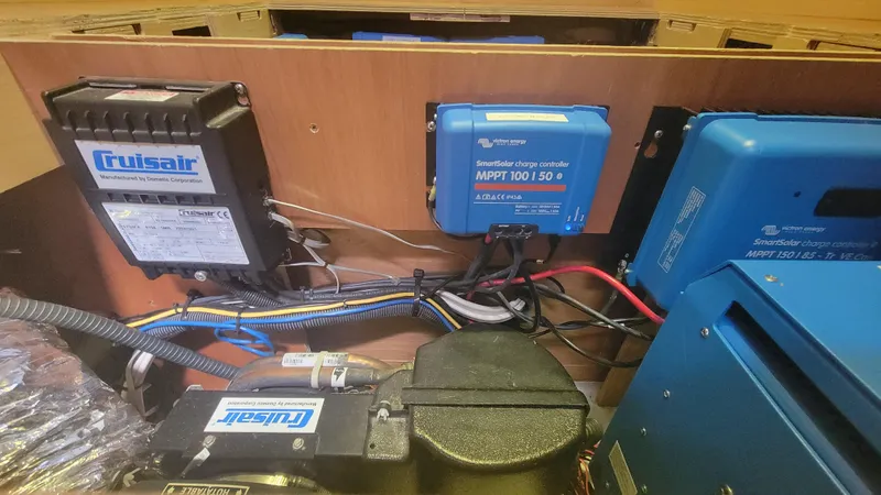 Momentum Yacht Photos Pics Electrical components inside a 2012 Lagoon 450 F yacht, featuring Victron Energy equipment.