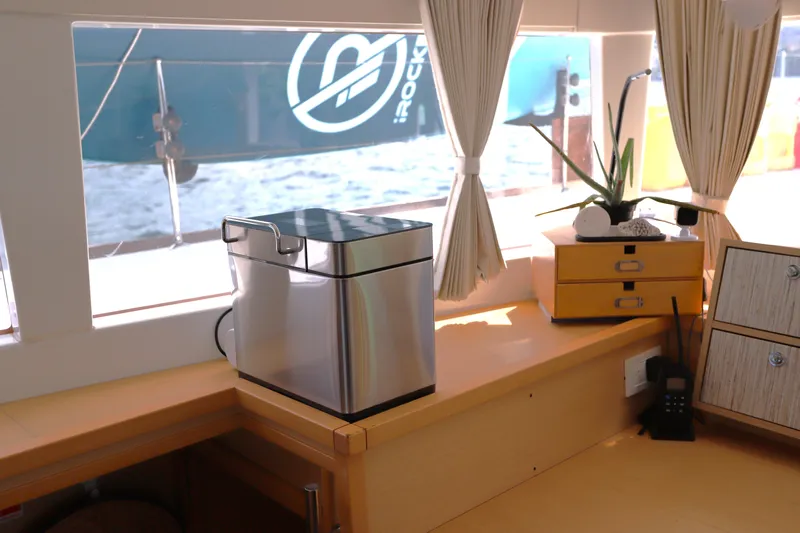 Momentum Yacht Photos Pics Interior of 2012 Lagoon 450 F yacht with coffee maker and potted plant.