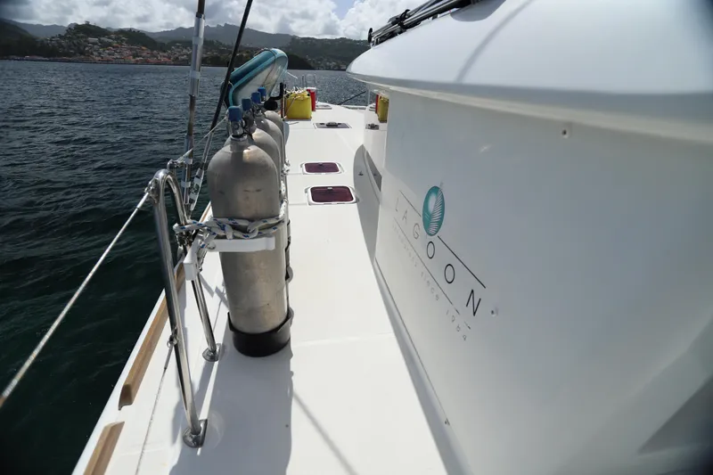 Momentum Yacht Photos Pics 2012 Lagoon 450 F catamaran deck with scuba tanks and ocean view.