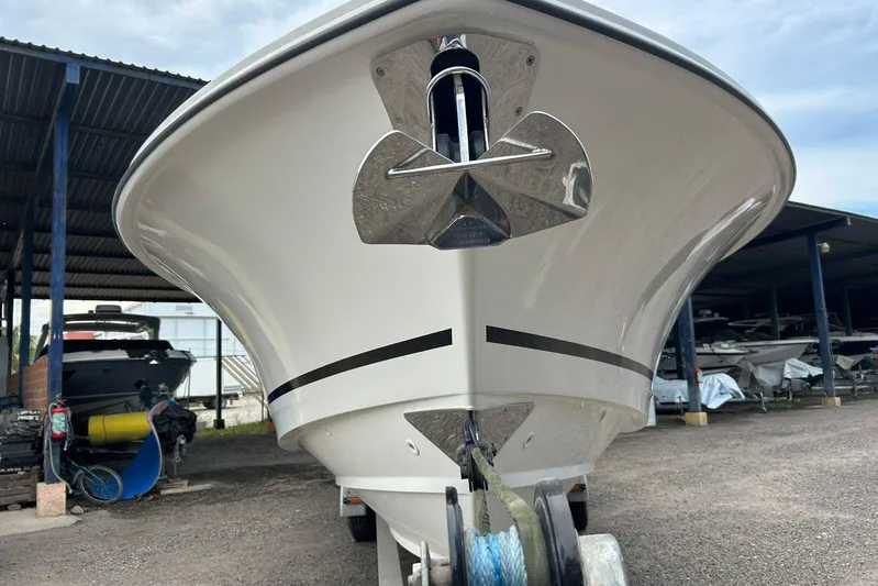 2020 Boston Whaler 330 Or @ Vallarta Yacht Photos Pics 2020 Boston Whaler 330 Outrage boat on trailer in storage facility.