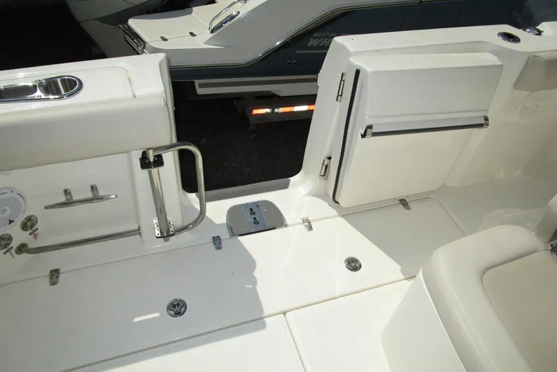 2020 Boston Whaler 330 Or @ Vallarta Yacht Photos Pics 2020 Boston Whaler 330 Outrage boat deck with seating and storage compartments.