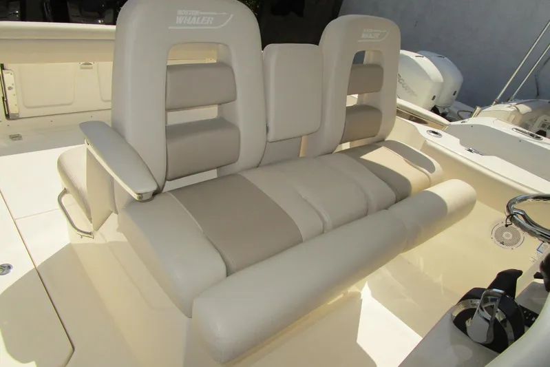 2020 Boston Whaler 330 Or @ Vallarta Yacht Photos Pics 2020 Boston Whaler 330 Outrage boat seating, featuring plush beige upholstery.